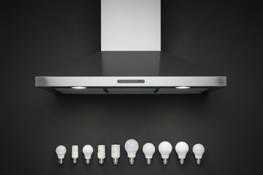 Stainless steel range hood with various light bulb types arranged below it
